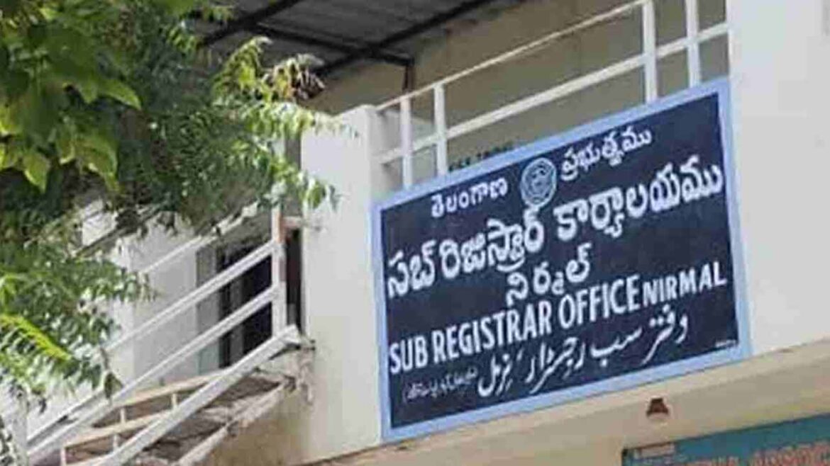 municipal officers seized nirmal sub registrar office due to property tax pending
